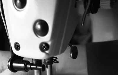 A sewing machine is in action